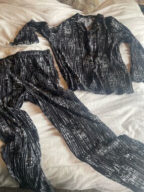 Dressed in LALA astronaut plisse set! Black Metallic Striped Two-Piece Set